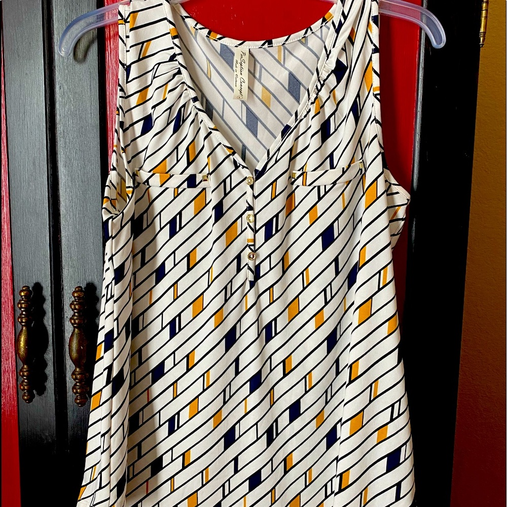 Sleeveless blouse with button opening